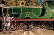  ?? CHARLOTTE GRAHAM/NRM ?? Curatorial team assistant Martyn Halman prepares SECR D 4-4-0 No. 737 ahead of the National Railway Museum’s reopening at York.