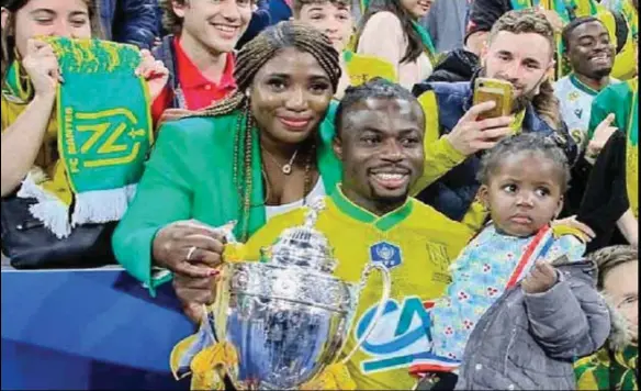  ?? ?? Moses Simon celebrates French Cup win with wife and kids