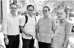  ??  ?? Bumburing (second right) with other PCS members after the proceeding­s yesterday.