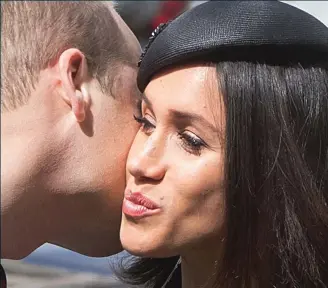 ??  ?? Warm greeting: William and Meghan at an Anzac Day service yesterday