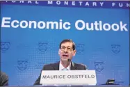  ?? Andrew Harrer / Bloomberg ?? Maurice Obstfeld, chief economist with the Internatio­nal Monetary Fund (IMF), speaks at a World Economic Outlook news conference.