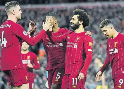  ?? F: AP ?? Henderson y Salah celebran un gol Los ‘reds’, ahora de vacaciones y sus jugadores Sub-23 disputarán hoy el ‘replay’ ante el Shrewsbury (3ª)