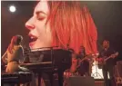  ?? NEAL PRESTON ?? Ally (Lady Gaga, at the piano) is a singer rocketing to fame in “A Star Is Born.”