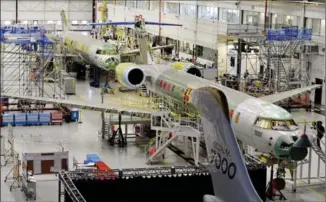  ?? CANADIAN PRESS FILE PHOTO ?? Bombardier, manufactur­er of the Global 7000 aircraft produced in Toronto, is cutting another 7,500 jobs around the world over the next two years.