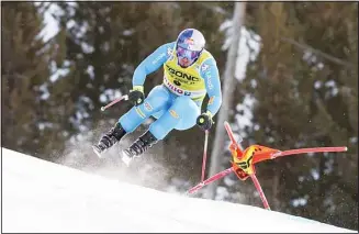  ?? ?? Italy’s Dominik Paris speeds down the course during an alpine ski, men’s World Cup downhill race, in Bormio, Italy, on Dec 28. (AP)