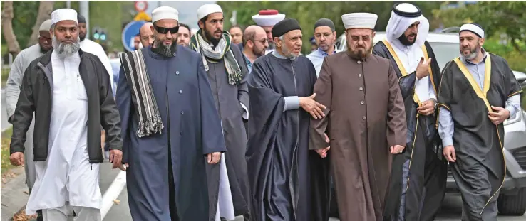  ?? Photo: AFP ?? Delegates and religious leaders walk towards the Al Noor mosque in Christchur­ch on March 23, 2019.