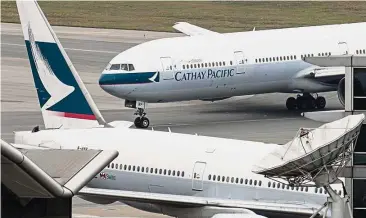  ?? – AFP ?? Tough competitio­n: Cathay’s net loss totaled HK$575mil (US$74mil) in 2016, while sales dropped 9.4% to HK$92.8bil.