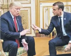  ??  ?? ► Trump y Macron durante su reunión del sábado.