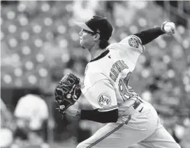  ?? JEFF ROBERSON/AP ⅔ ?? Orioles starting pitcher Spenser Watkins gave up eight hits and seven earned runs in 3 innings in Wednesday night’s 10-1 loss to the Cardinals in St. Louis.