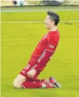  ?? REUTERS ?? Bayern Munich’s Robert Lewandowsk­i celebrates his goal.