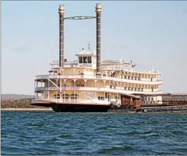  ?? KRISTI GARABRANDT — THE NEWS-HERALD ?? The Showboat Branson Belle, on Table Rock Lake, hosts dinner-theater cruises in its three-story dining room theater that seats up to 700 people.