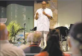  ?? Nancee E. Lewis ?? DAVID CAMPT speaks to a predominan­tly white audience about how to become a “white ally” in combating racism this month at the Unity Center in San Diego.