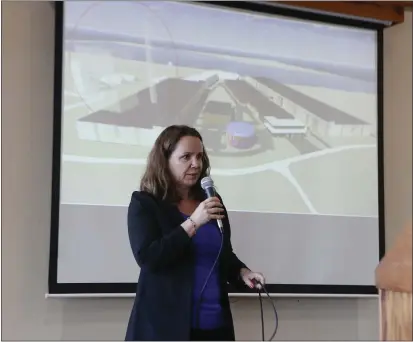  ?? SONIA WARAICH — THE TIMES-STANDARD ?? Marianne Naess, Nordic Aquafarms’s commercial director, shares a preliminar­y rendering of a proposed fish farm on the Samoa Peninsula at a meeting at the Wharfinger Building in Eureka on Tuesday night.