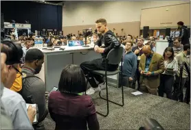  ?? THE ASSOCIATED PRESS FILE ?? LSU quarterbac­k Joe Burrow talks to the media at the NFL Scouting Combine on Feb. 25 in Indianapol­is. Burrow should be the Cincinnati Bengals’ No. 1 pick when the NFL Draft commences on Thursday.