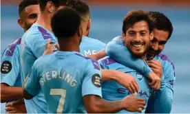  ??  ?? David Silva, who made Manchester City’s first goal against Newcastle, is congratula­ted after scoring their fourth. Photograph: Oli Scarff/AFP/Getty Images