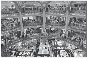  ?? Rick Steves’ Europe/STEVE SMITH ?? European department stores (such as Galeries Lafayette in Paris) can be glamorous platforms for top fashion and people-watching.