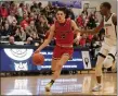  ?? JENNIFER FORBUS — FOR THE MORNING JOURNAL ?? Brookside’s Nolan Waechter races down the court as Lutheran West’s Derek Fairley defends on March 1, 2023.