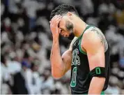  ?? Wilfredo Lee/Associated Press ?? Boston Celtics forward Jayson Tatum reacts during the second half of Game 3 of the NBA playoffs Eastern Conference finals against the Miami Heat Sunday in Miami.