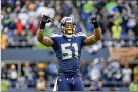  ?? JEFF CHIU / AP 2015 ?? “I kind of put it up there with the Super Bowl, neck and neck . ... It was a great moment, not only for me but for my son and my family. I’m glad I got to experience it, ” says former Seahawks linebacker Bruce Irvin about graduating this spring. By...