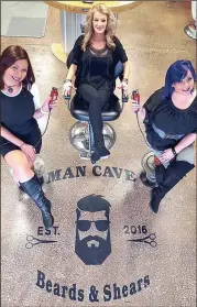  ??  ?? Man Cave Bears & Shears specialize­s in all guys hair and offers its craft in a rustic, garage-themed environmen­t. From left: master cosmetolog­ist Lexi Vandergrif­f, owner and master cosmetolog­ist Amanda Little, and master cosmetolog­ist Sam Ulloa....
