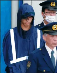  ?? JIJI PRESS ?? Tatsuya Ichihashi, who raped and killed the British teacher Lindsay Ann Hawker in 2007, arrives at the Gyotoku police station in Ichikawa city in suburban Tokyo in November 2009.