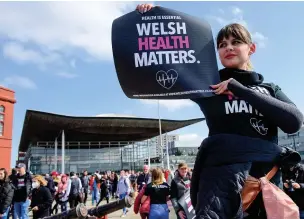  ?? Picture: Mark Lewis ?? Gym members and owners from across Wales marched from Cardiff City Hall to the Senedd to protest about the closure of gyms and fitness groups.
