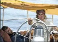  ??  ?? Tami (Shailene Woodley) has to take over sailing their badly damaged yacht after her boyfriend Richard (Sam Claflin) is badly injured during a cataclysmi­c storm in Baltasar Kormakur’s Adrift.