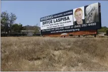  ?? Katharine Lotze/The Signal ?? A Billboard seeking informatio­n on Bryce Laspisa sits in Castaic.