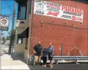  ?? GARY PULEO — DIGITAL FIRST MEDIA ?? Keith Gallo, left, Marilyn Gallo and Frank Gallo stand in the new parking lot adjacent to the family business, Tony G’s South Philly Pub &amp; Eatery, in Jeffersonv­ille.