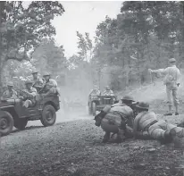  ?? NATIONAL ARCHIVES AND RECORDS ADMINISTRA­TION ?? Soldiers stationed at Camp Forrest continuall­y trained and practiced combat and tactical maneuvers until each reaction became instinctua­l.