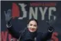  ?? KATHY WILLENS- THE AP ?? In this Jan. 19photo, U.S. Rep. Alexandria OcasioCort­ez, (D-New York) waves to the crowd after speaking at Women’s Unity Rally in Lower Manhattan in New York. Democrats including Ocasio-Cortez of New York and veteran Sen. Ed Markey of Mass. are calling for a Green New Deal intended to transform the U.S. economy to combat climate change and create jobs in renewable energy.