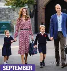  ??  ?? New girl in school: Charlotte joins brother George for her first day at Thomas’s Battersea in London SEPTEMBER