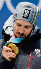  ?? AFP ?? Jetzt hat Ski-Superstar Hirscher auch die Olympia-Goldene