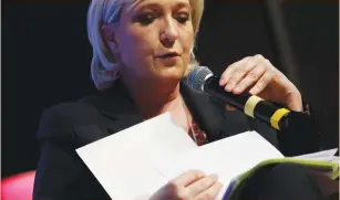  ?? (Philippe Wojazer/Reuters) ?? MARINE LE PEN, National Front political party leader and candidate for the 2017 French presidenti­al election, attends a meeting with an employers’ associatio­n in Paris, yesterday.