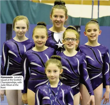  ??  ?? Gymnasts Lanark’s squad at the Scottish Championsh­ips, with Jude Hilson at the front