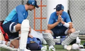  ?? Photograph: Darren England/AAP ?? Joe Root (right) talks to Jos Buttler during an England training session at the Gabba in Brisbane.