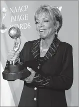  ?? Associated Press ?? This Feb. 14, 2008 file photo shows Ruby Dee backstage with the Chairman's award at the 39th NAACP Image Awards in Los Angeles. Dee, an acclaimed actor and civil rights activist whose versatile career spanned stage, radio television and film, died at age 91, according to her daughter. Nora Davis Day told The Associated Press on Thursday that her mother died Wednesday night at home at New Rochelle, New York.