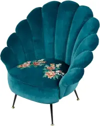 ??  ?? LOUNGING AROUND This Gucci Decor high-back armchair boasts a seashellli­ke shape and is available in textured pink moire fabric, plush teal or black velvet. The motifs on the seat are embroidere­d and then handapplie­d in a five-hour process.