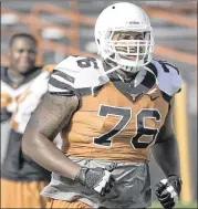  ?? RALPH BARRERA/ AMERICAN-STATESMAN ?? Right tackle Kent Perkins was voted the offensive MVP of the Longhorns’ victory over Kansas State, when Texas rushed for 274 yards.