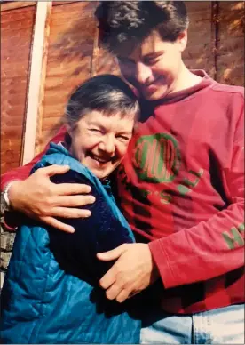  ?? ?? INNOCENT: Justin, left, aged seven, before his boarding school ordeal. Above: With mother Gloria, who sent him to a place where children were ‘tortured’