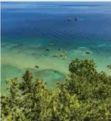  ??  ?? Kayakers on Lake Huron in Michigan, U. S. A. courtesy of the author