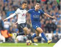  ??  ?? Spurs’ Dele Alli holds off Danny Drinkwater.