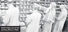  ??  ?? Santa helps out at the sorting office in 1966