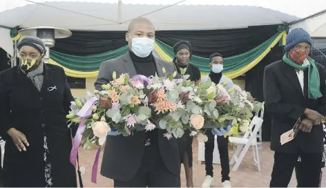  ?? Picture: Gallo Images ?? SAD FAREWELL. Friends and family attend the funeral service of Mirriam Mashatile on 26 June in Pretoria. She was the mother of ANC treasurer general Paul Mashatile. She died in her sleep on 22 June.