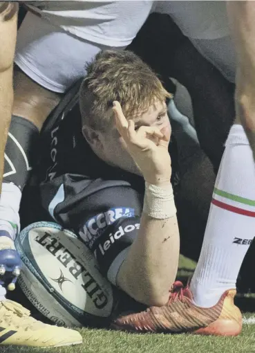  ?? ?? Glasgow Warriors hooker Johnny Matthews celebrates the second of his three tries against Zebre