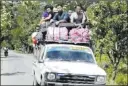  ??  ?? The Associated Press Residents displaced by violence in Myanmar ride on a truck Sunday in Buthidaung township, in Rakhine State.