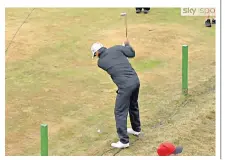  ??  ?? Recovery: Padraig Harrington steps over a fence to play his ball en route to an unlikely birdie at the sixth hole