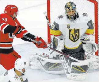  ?? Karl B Deblaker ?? The Associated Press Marc-andre Fleury stops Carolina’s Jeff Skinner from in close, one of his 27 saves in a 5-1 victory.