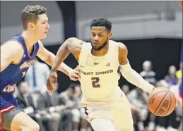  ?? Hans Pennink / Special to the Times Union ?? Guard Ahmad Clark (2), who was Ualbany’s leading scorer up until Thursday, will come off the bench for the second consecutiv­e game.