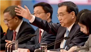  ?? — AFP ?? Li Keqiang at a press conference after the closing session of the National People’s Congress in the Great Hall of the People in Beijing on Tuesday.